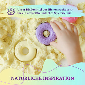 Gelber Spielsand mit Bienenwachs und kindgerechtem Zubehör. Natürliches Spielmaterial für umweltfreundliche Beschäftigung